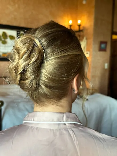 Close-up of a textured low bun seen from behind